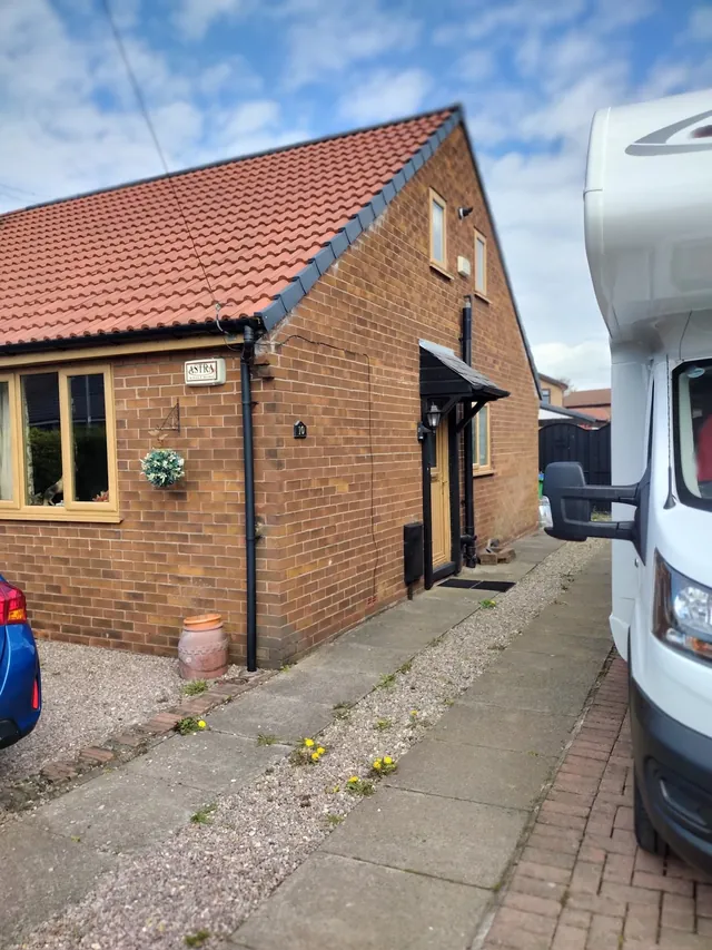 brick bungalow before work